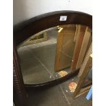 A wood framed mirror
