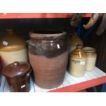 A quantity of stoneware to include jugs, pots, etc.