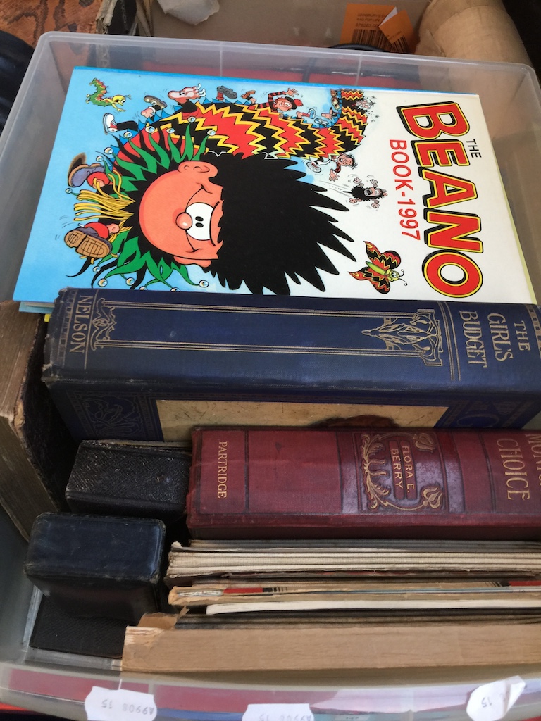 A box of books including Beano annuals, prayer books, old maps etc.