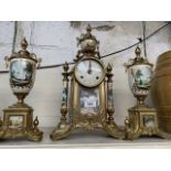 A reproduction clock garniture.