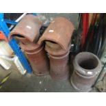 3 terracotta chimney pots - 2 with covers.