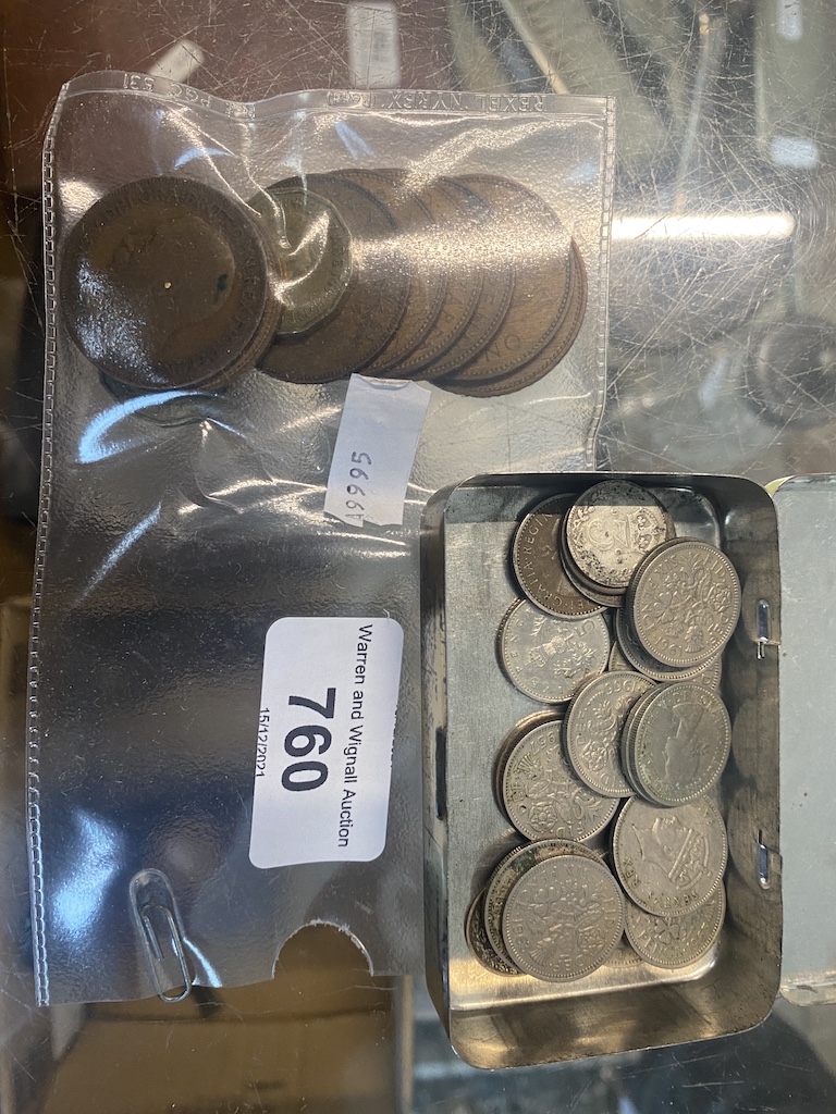 Small tin of sixpenses and bag of copper coins