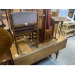 A retro teak drop leaf table and chairs by Bath Cabinet Makers.