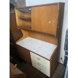 A 1950s teak and melamine highboard.