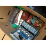 A box of misc including old tins, cutlery sets, gloves, etc.