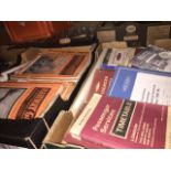 A box of 40 Railway Gazette magazines and a box of various railway timetable books
