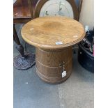 An oak barrel/coffee table.