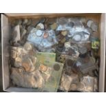 A box of world coins and banknotes.