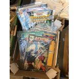 Box containing a collection of various comics, mostly first editions.