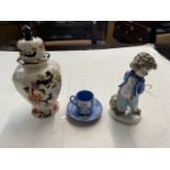 A Nao clown, A Masons lidded vase and a Wedgwood blue and white jasperware cup and saucer.
