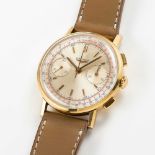 A GENTLEMAN'S 18K SOLID YELLOW GOLD LONGINES FLYBACK CHRONOGRAPH WRIST WATCH DATED 1969, REF. 7414
