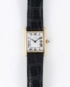 A LADIES 18K SOLID GOLD CARTIER PARIS TANK WRIST WATCH CIRCA 1990s, REF. 8660 Movement: Quartz,