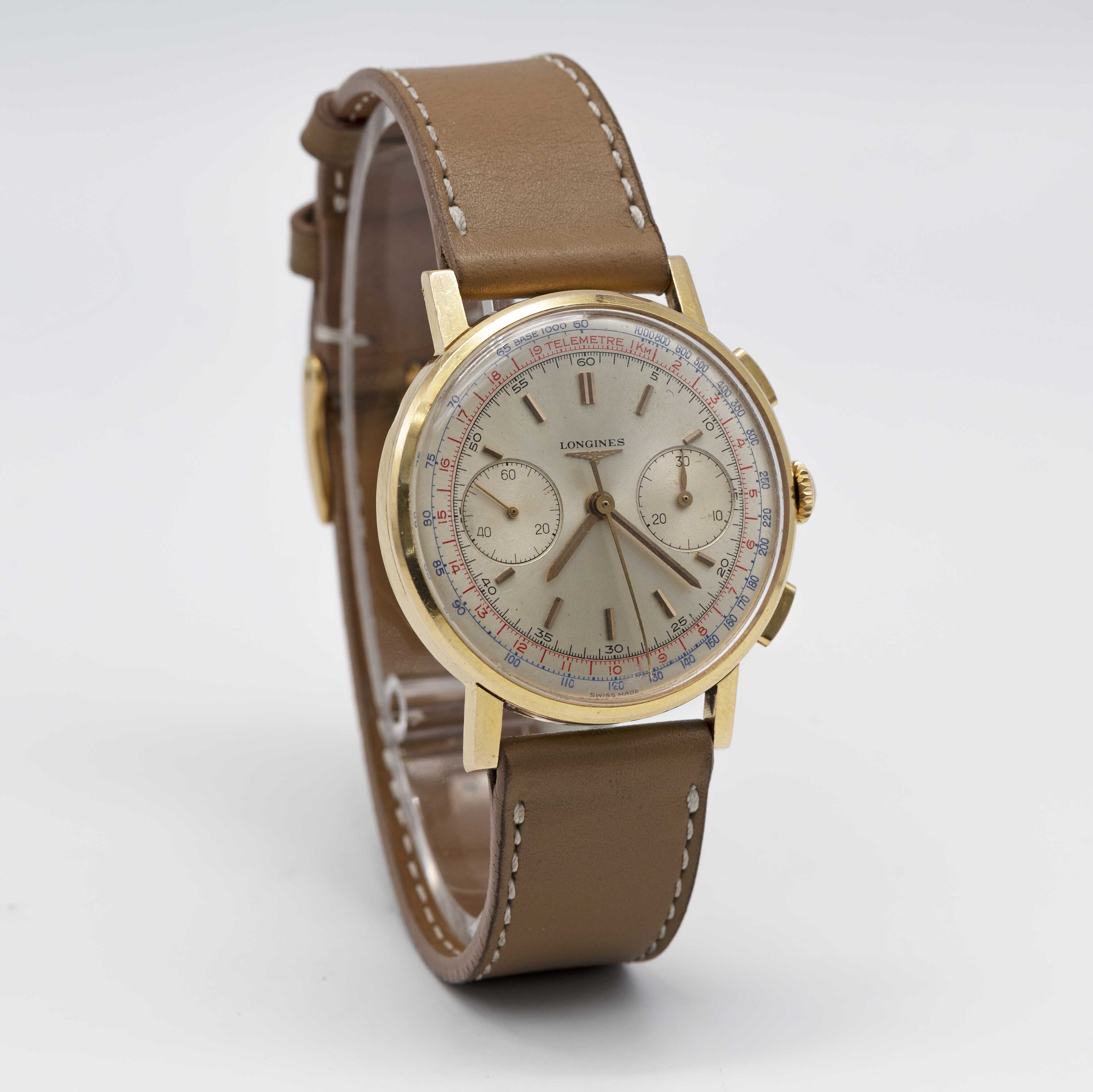 A GENTLEMAN'S 18K SOLID YELLOW GOLD LONGINES FLYBACK CHRONOGRAPH WRIST WATCH DATED 1969, REF. 7414 - Image 5 of 9