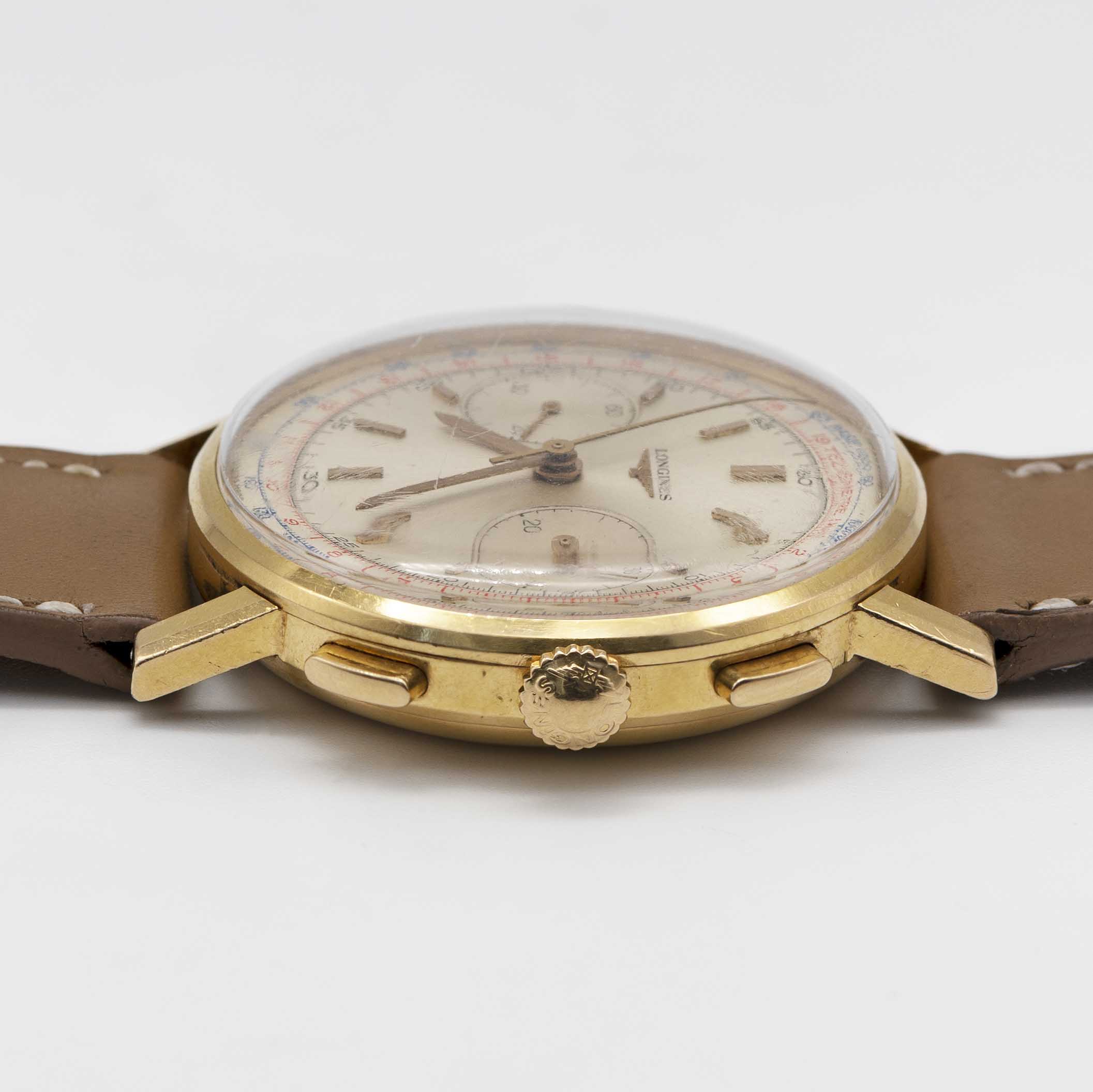 A GENTLEMAN'S 18K SOLID YELLOW GOLD LONGINES FLYBACK CHRONOGRAPH WRIST WATCH DATED 1969, REF. 7414 - Image 8 of 9