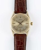 A GENTLEMAN'S 14K SOLID GOLD ROLEX OYSTER PERPETUAL WRIST WATCH CIRCA 1959, REF. 6565/6567 Movement: