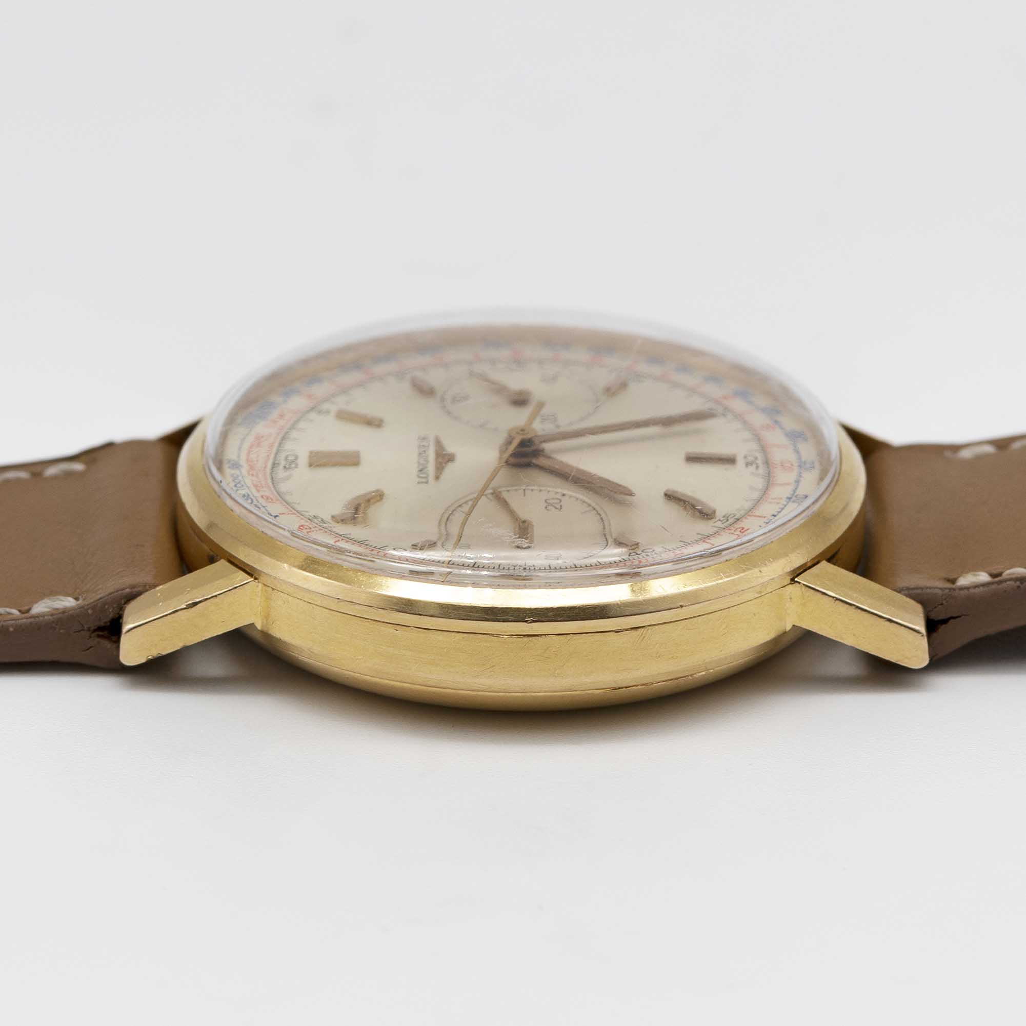 A GENTLEMAN'S 18K SOLID YELLOW GOLD LONGINES FLYBACK CHRONOGRAPH WRIST WATCH DATED 1969, REF. 7414 - Image 9 of 9