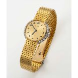 A FINE & RARE LADIES 18K SOLID GOLD & DIAMOND CARTIER LONDON BRACELET WATCH CIRCA 1957, WITH