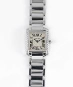 A LADIES 18K SOLID WHITE GOLD CARTIER TANK FRANCAISE BRACELET WATCH CIRCA 2005, REF. 2403 WITH AFTER