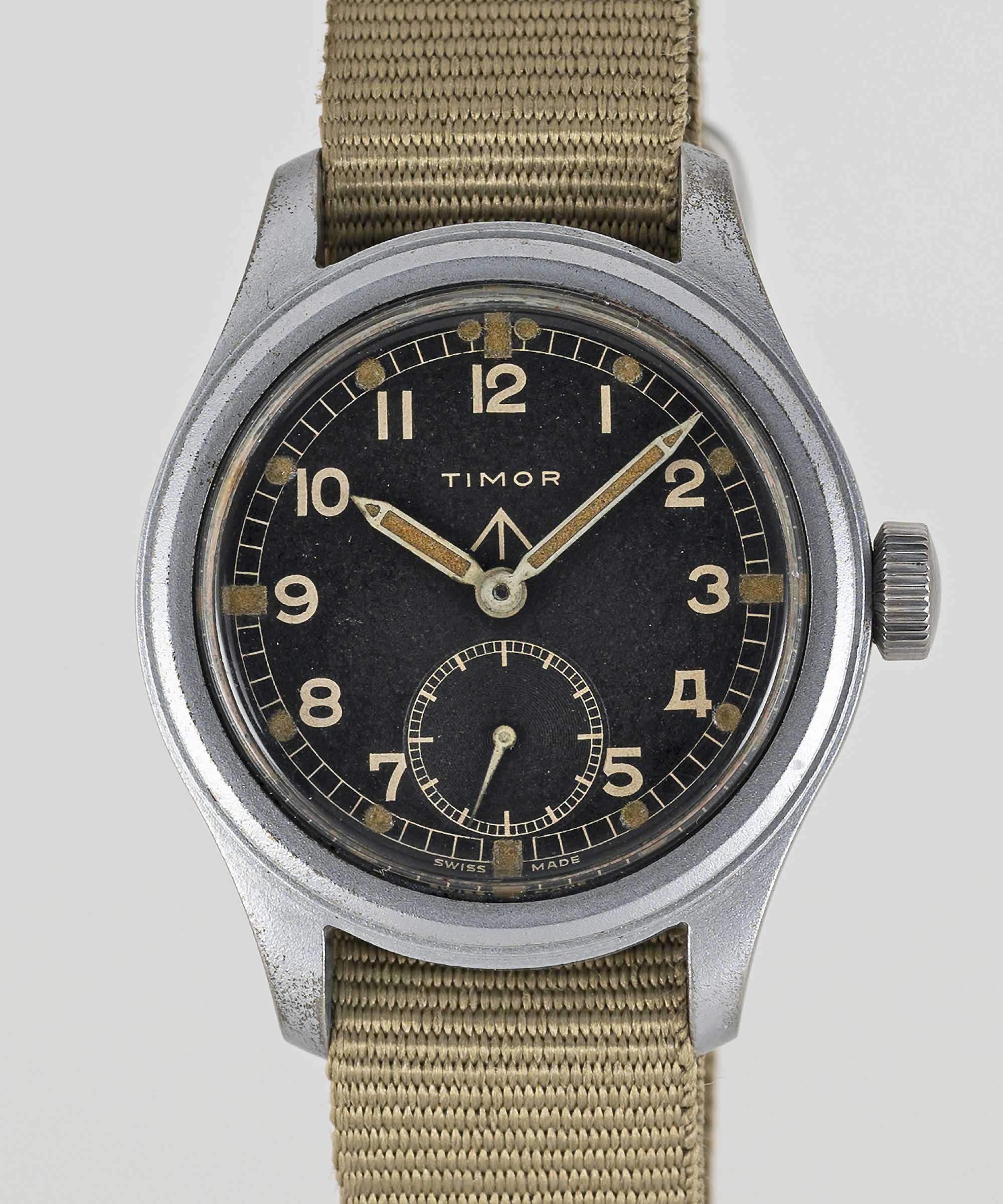 A GENTLEMAN'S STAINLESS STEEL BRITISH MILITARY TIMOR W.W.W. WRIST WATCH CIRCA 1945, PART OF THE "