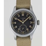 A GENTLEMAN'S STAINLESS STEEL BRITISH MILITARY TIMOR W.W.W. WRIST WATCH CIRCA 1945, PART OF THE "