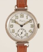 A GENTLEMAN'S SOLID SILVER LONGINES OFFICERS TRENCH WRIST WATCH CIRCA 1916, WITH WHITE ENAMEL DIAL