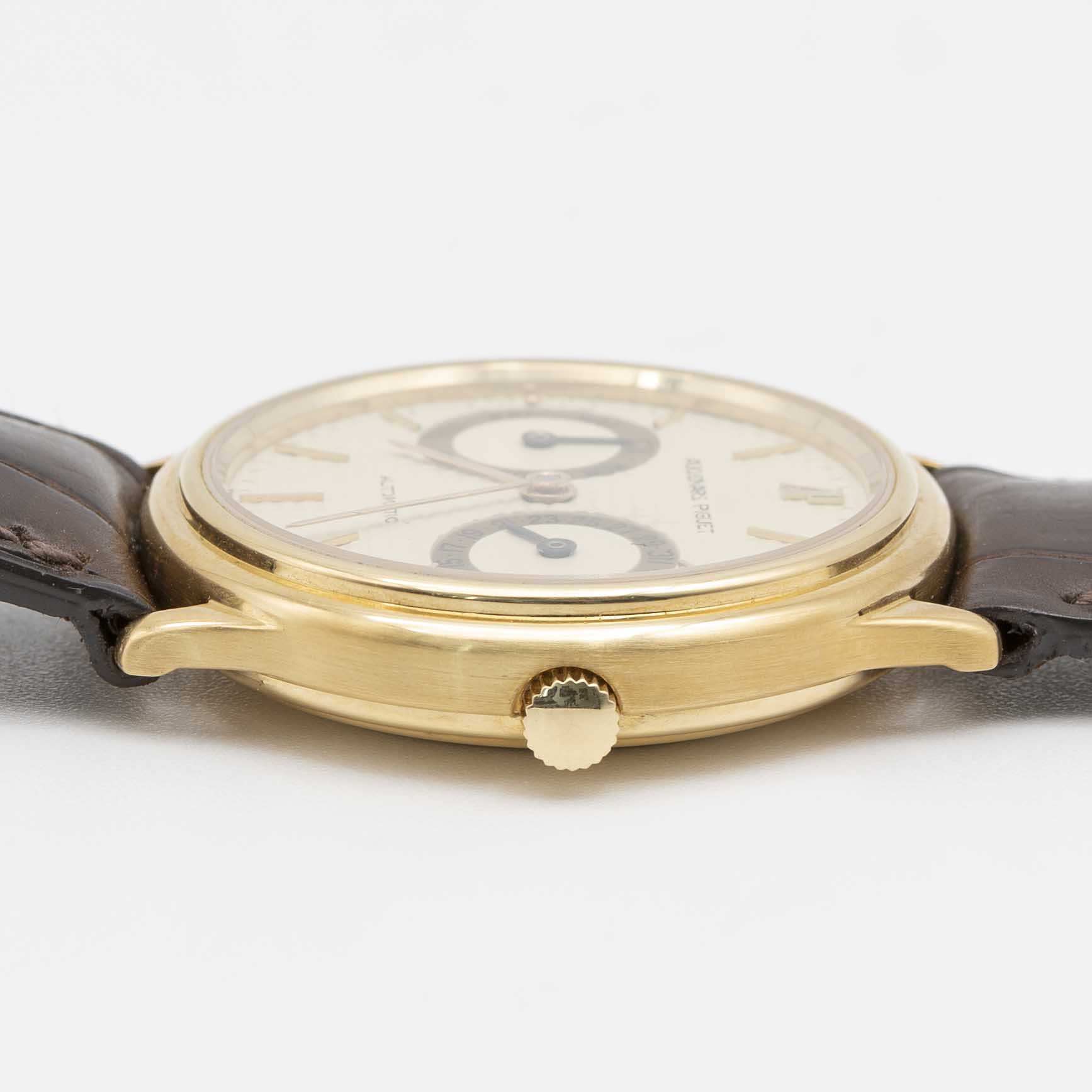 A GENTLEMAN'S 18K SOLID GOLD AUDEMARS PIGUET AUTOMATIC DAY DATE WRIST WATCH CIRCA 1990, WITH - Image 8 of 9