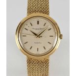 A GENTLEMAN'S 18K SOLID YELLOW GOLD IWC AUTOMATIC BRACELET WATCH CIRCA 1970s Movement: 21J,