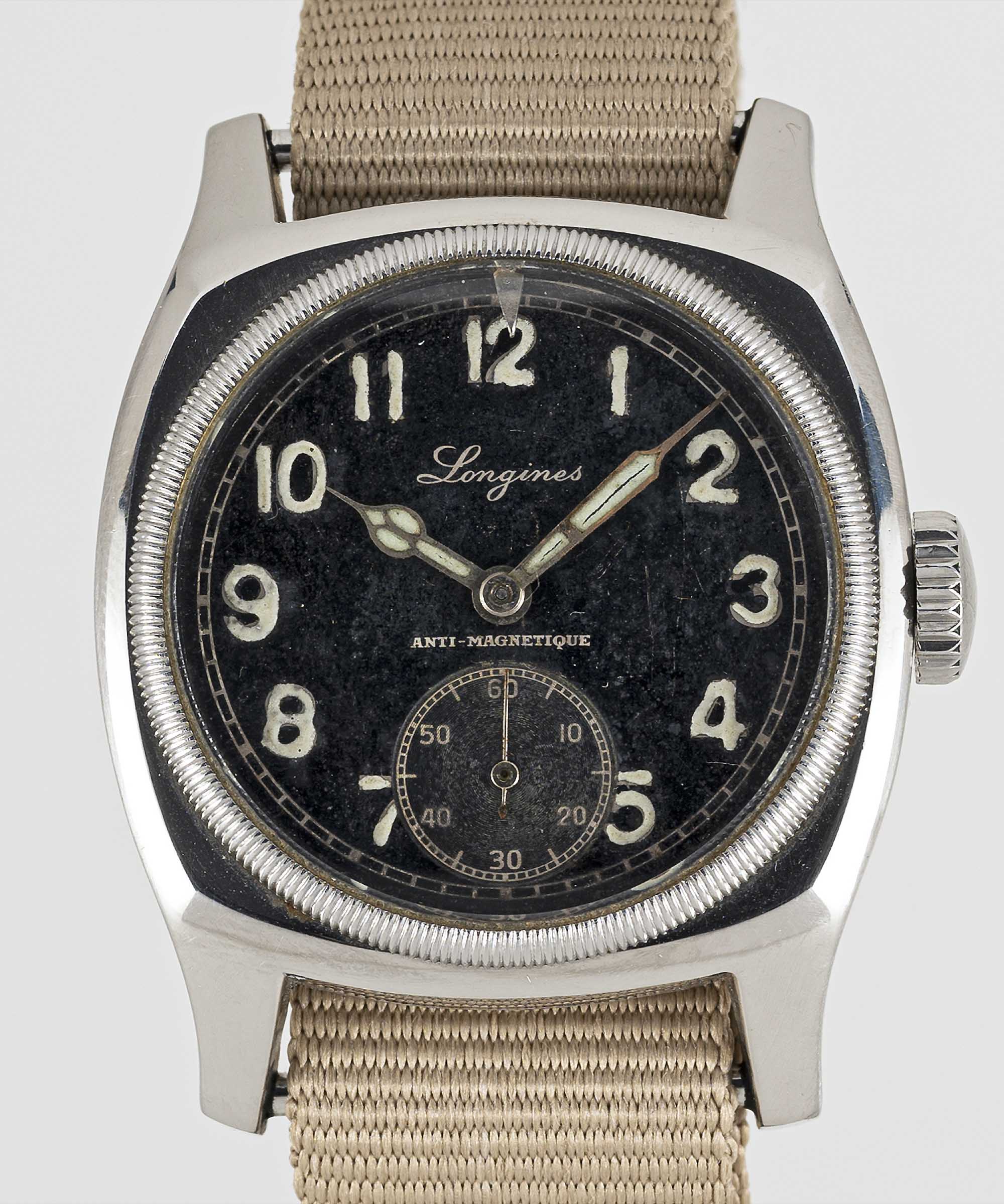 A GENTLEMAN'S STAINLESS STEEL CZECH MILITARY AIR FORCE LONGINES PILOTS WRIST WATCH CIRCA 1947