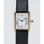 A GENTLEMAN'S SIZE 18K SOLID GOLD CARTIER PARIS TANK LOUIS MECANIQUE WRIST WATCH CIRCA 1980, REF.