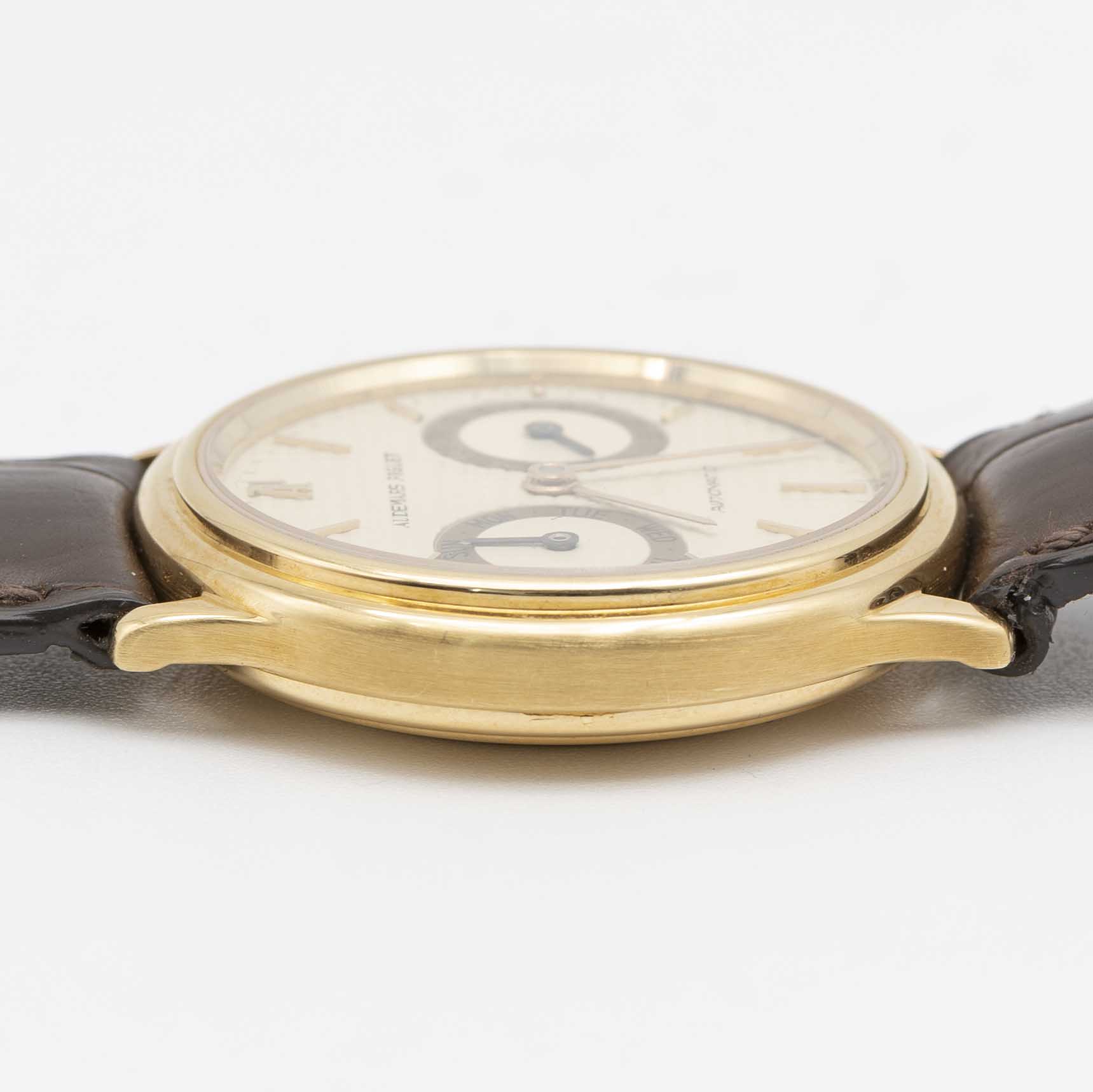 A GENTLEMAN'S 18K SOLID GOLD AUDEMARS PIGUET AUTOMATIC DAY DATE WRIST WATCH CIRCA 1990, WITH - Image 9 of 9