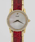 A FINE 18K SOLID GOLD & DIAMOND PIAGET BRACELET WATCH CIRCA 1990s, REF. 5895 WITH MOTHER OF PEARL