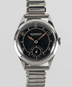A GENTLEMAN'S STAINLESS STEEL JAEGER LECOULTRE WRIST WATCH CIRCA 1940, WITH BLACK SECTOR DIAL
