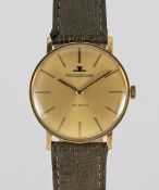A GENTLEMAN'S 18K SOLID GOLD JAEGER LECOULTRE WRIST WATCH CIRCA 1960s ORIGINALLY RETAILED BY