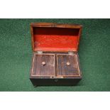 Regency rosewood sarcophagus shaped tea caddy the top opening to reveal two lidded tea compartments,