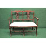 Edwardian two seater chair back settee the back having pierced back splats supported by scrolled