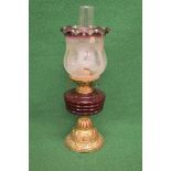Brass oil lamp having red glass reservoir and etched glass shade - 20" tall including glass