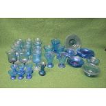 Group of blue glassware having bubble inclusions to comprise: twelve various stemmed drinking