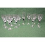 Part suite of Orrefors stemmed drinking glasses the steps having bulbous shape with dark blue glass