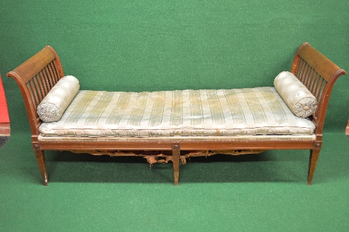 Large walnut window seat/day bed having scrolled slatted ends with removable seat cushion and