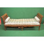 Large walnut window seat/day bed having scrolled slatted ends with removable seat cushion and