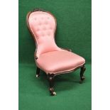 Victorian mahogany framed spoon back nursing chair the frame having carved top rail over a button