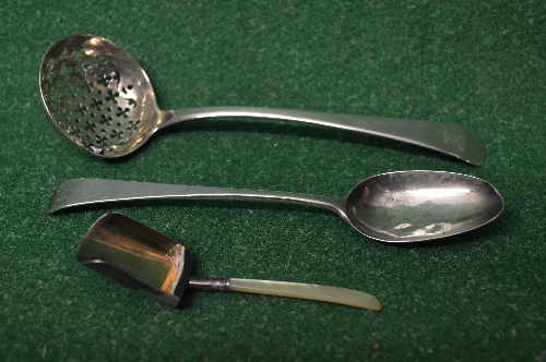 Early silver sifter spoon, marked for London together with an early silver table spoon,