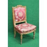 19th century gilt show wood framed salon chair having faded red upholstered padded back and seat