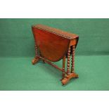 19th century mahogany Sutherland table having two bow drop leaves with moulded edge supported by