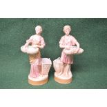 Pair of Royal Dux figures No. 2079 and No. 2078 of a young male and female holding baskets - 10.