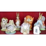 Group of seven Royal Albert Beatrix Pottery figures to include: Jeremy Fisher, Peter Rabbit,