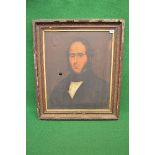 Unsigned oil on canvas portrait of a dark haired gentleman wearing a black coat and white shirt,