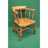 Victorian captains chair having scrolled back and arms supported by turned spindles leading to