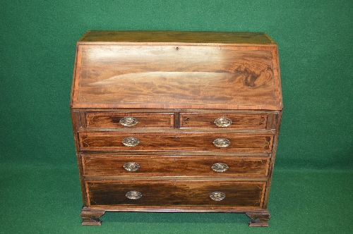 19th century mahogany and cross banded bureau having fall front opening to reveal fitted interior