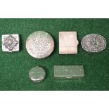 Group of six silver pill boxes having a mix of engraved and embossed raised decoration